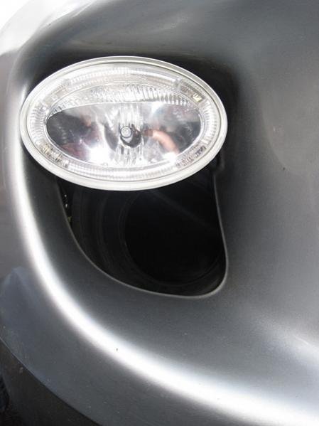 Hella elliptical Angel Eye - LED side-light with 4300K HID. 
With 6" to 4" Supra suction behind.