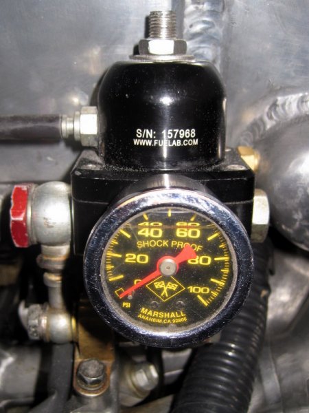 Fuelab adjustable fuel pressure regulator with an oil filled Marshall gauge on bespoke plumbing.

Thank you Chrispot. :)