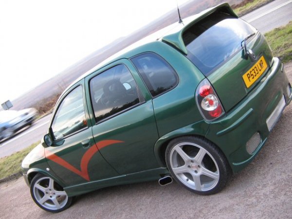 after its first trip to the bodyshop, rear doors smoothed, de locked, full combat bodykit, spoiler, de badged, fresh paint, lowered 40mm, 17" rims.