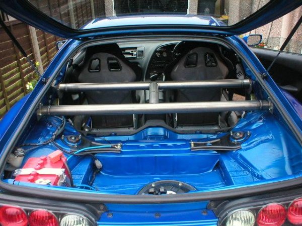 one-off titanium strut/harness bar