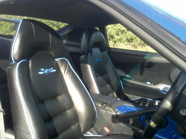 Seats Re-Trimmed In Leather With Blue Piping And MKIV Supra Logo Stitched In