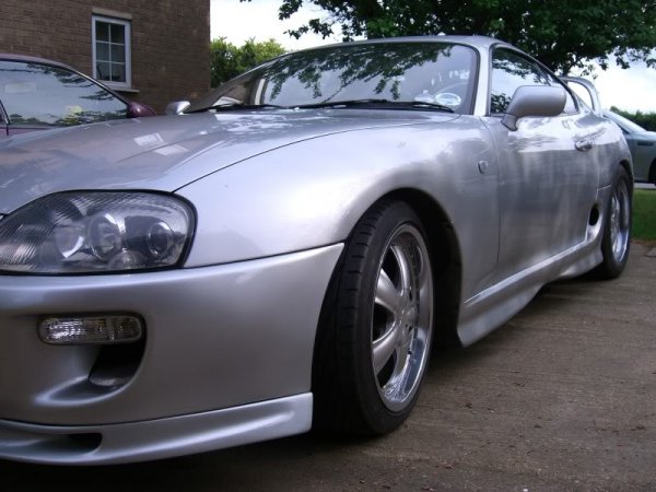 Stock skirts and flares with original Paul Whiffin front splitter