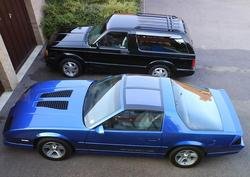 My Typhoon is the black SUV next to a Z28 Iroc.